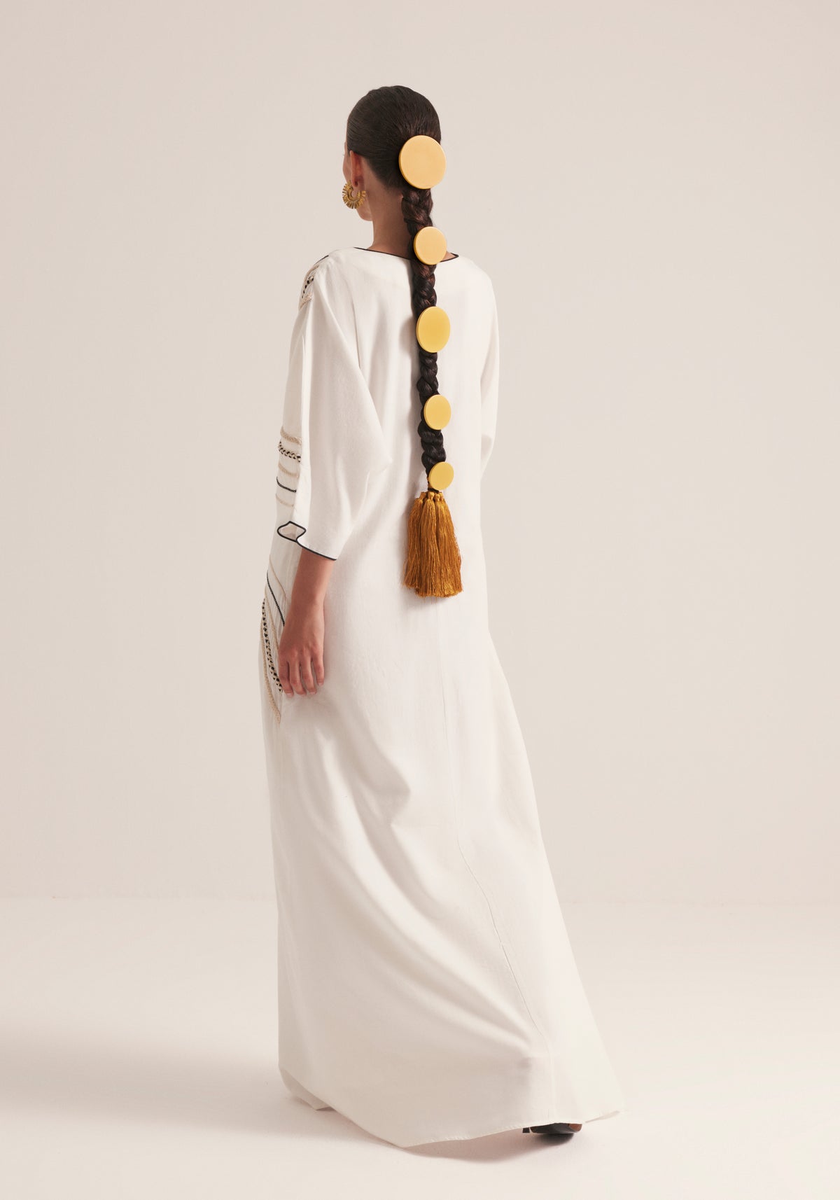 Off white Kaftan with traffic swirls of embroidery