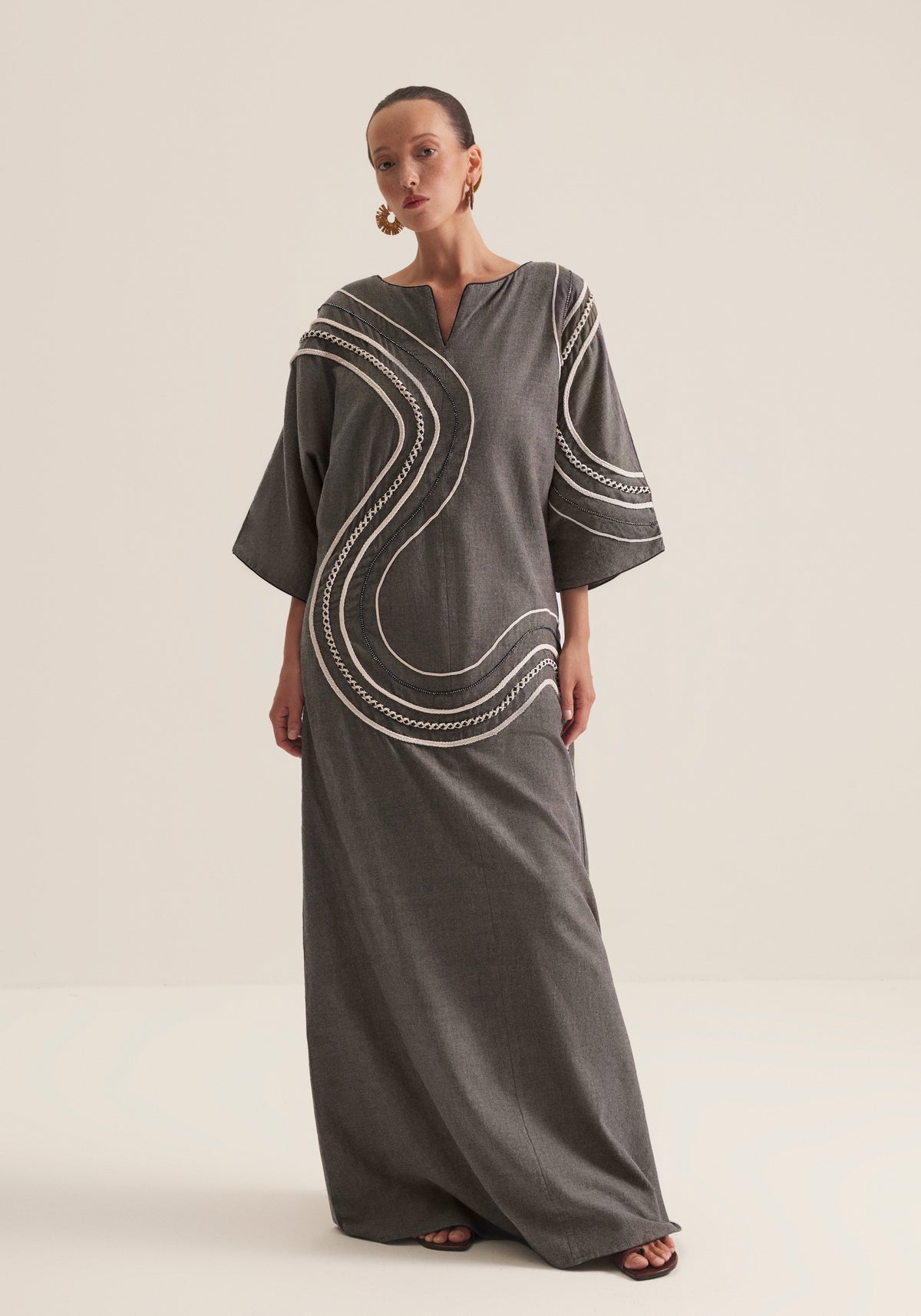 Charcoal Kaftan with graphic swirls of embroidery