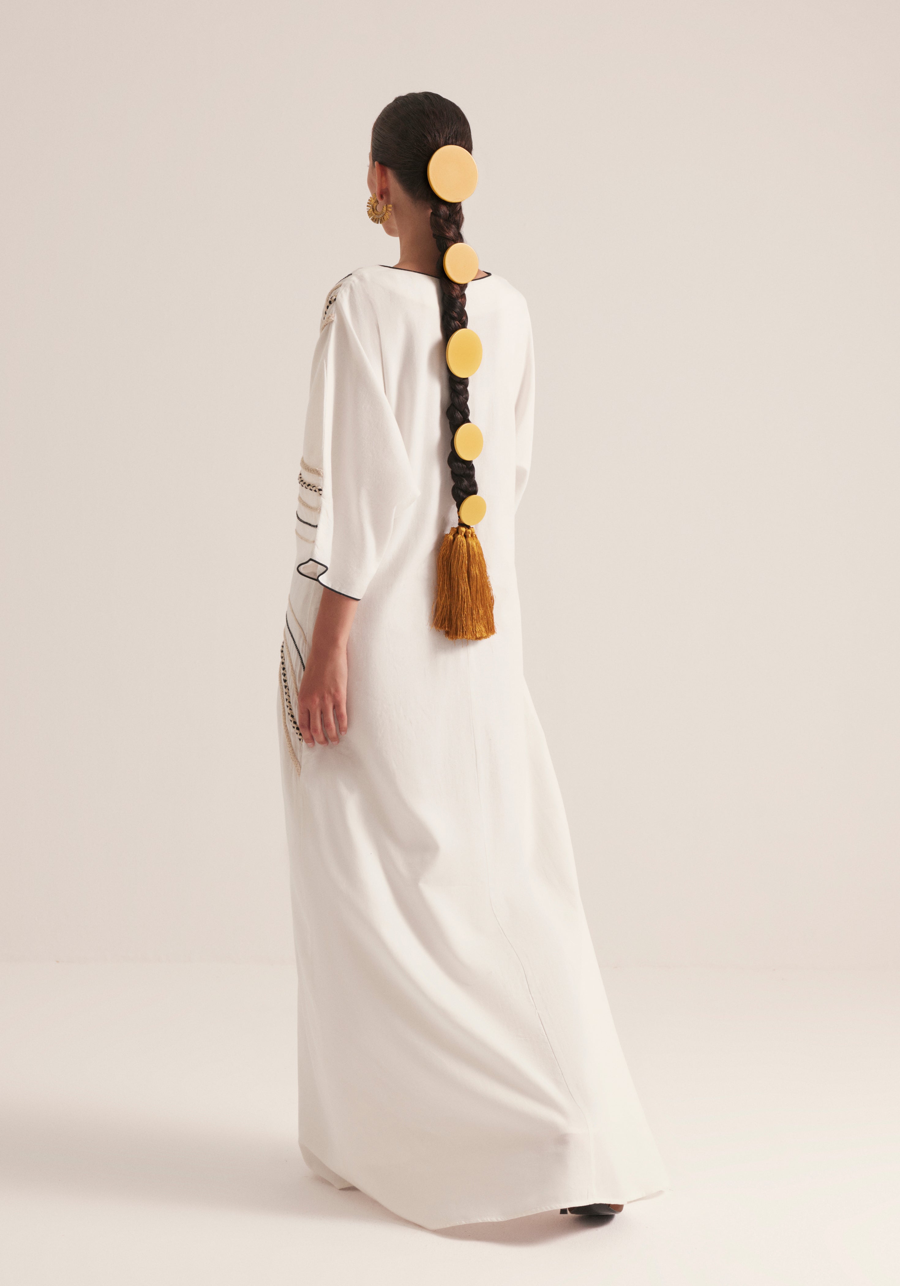 Off white Kaftan with traffic swirls of embroidery